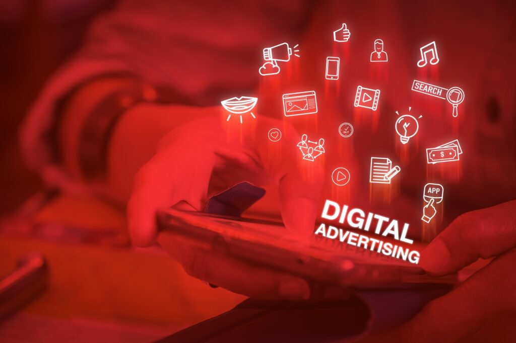 Close up of a hand using a phone and seeing digital advertising